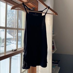 loose tank top with cross pattern on each side